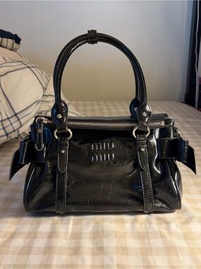 Shiny Leather Top Handle Bow Bag